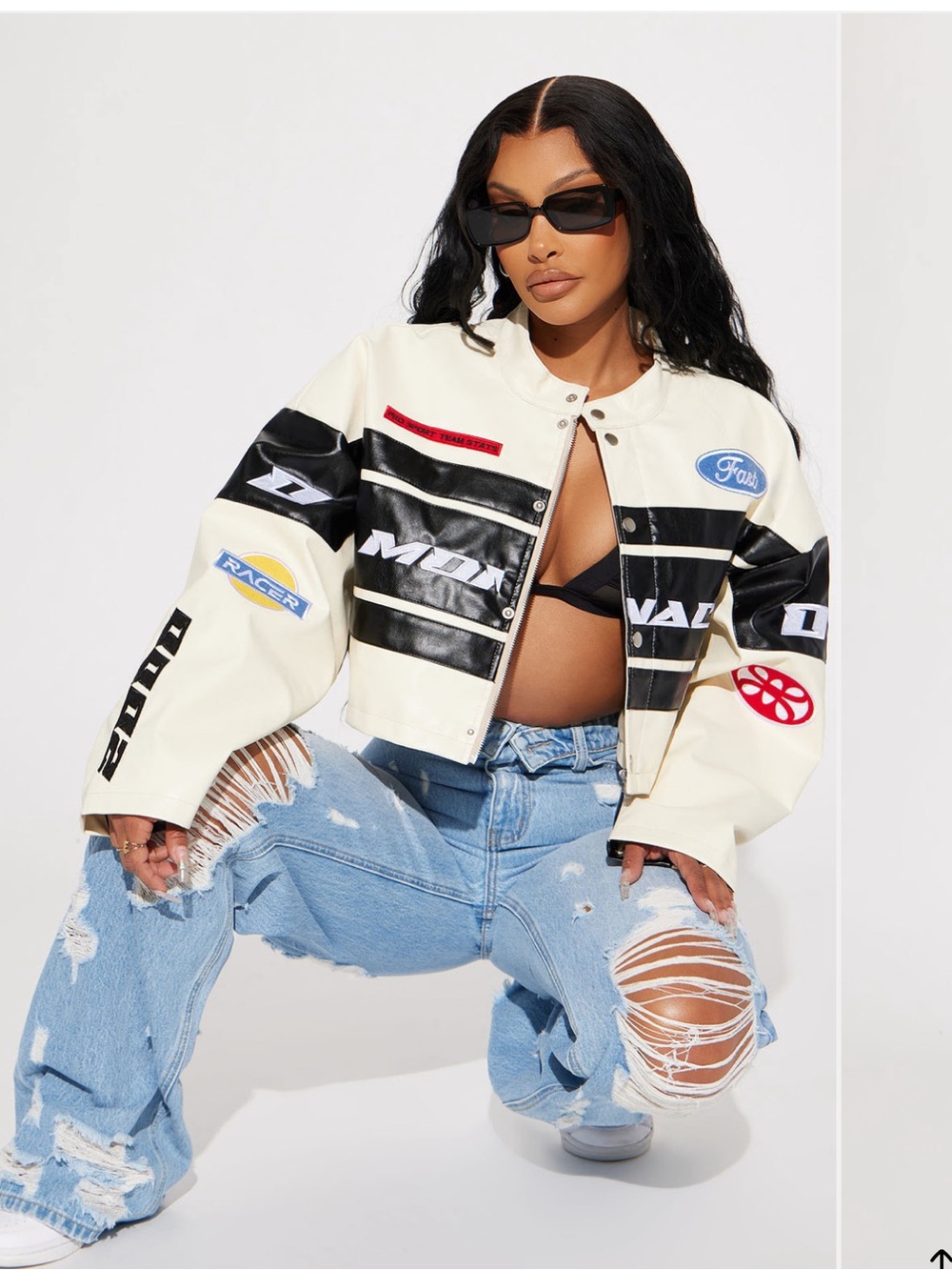 Fashion Nova Cream and Black Racing Patch Cropped Jacket
